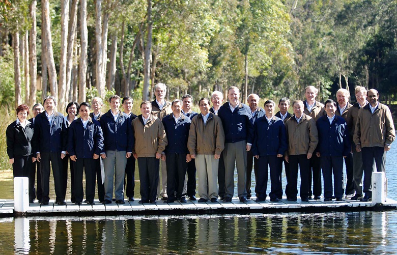 APEC Finance Ministers photograph wearing iconic Australian 'Driazabone' coats and 'R. M. Williams' shirts